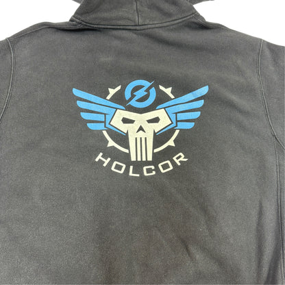 背中の翼のドクロと HOLCOR のプリント