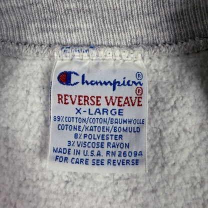 首元の Champion REVERSE WEAVE 刺繍タグ X-LARGE MADE IN U.S.A.