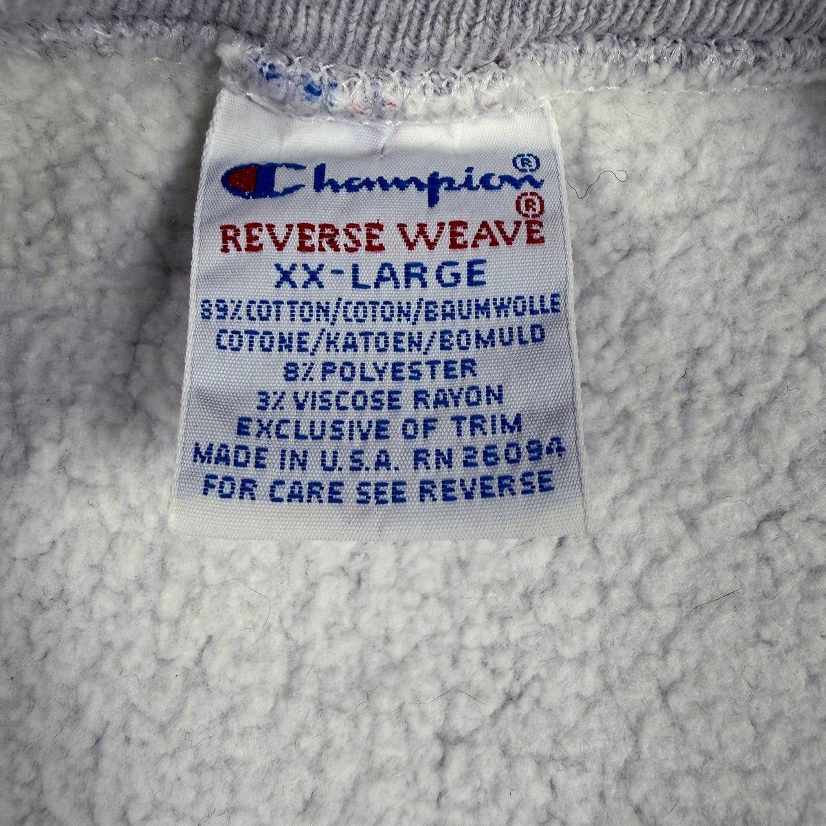 首元の Champion REVERSE WEAVE 刺繍タグ XX-LARGE MADE IN U.S.A.