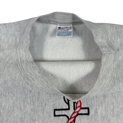 首元の Champion REVERSE WEAVE 刺繍タグ 引き