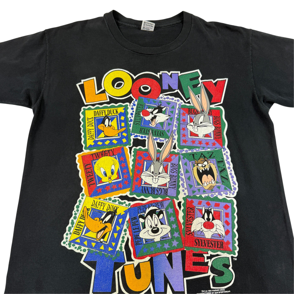 スタンプ柄プリント全体寄り LOONEY TUNES ロゴ