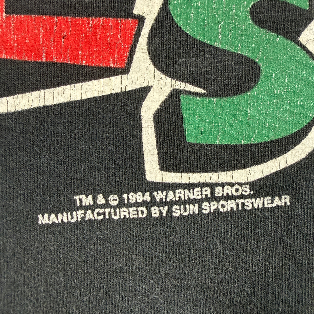 TM & © 1994 WARNER BROS. / MANUFACTURED BY SUN SPORTSWEAR の権利表記