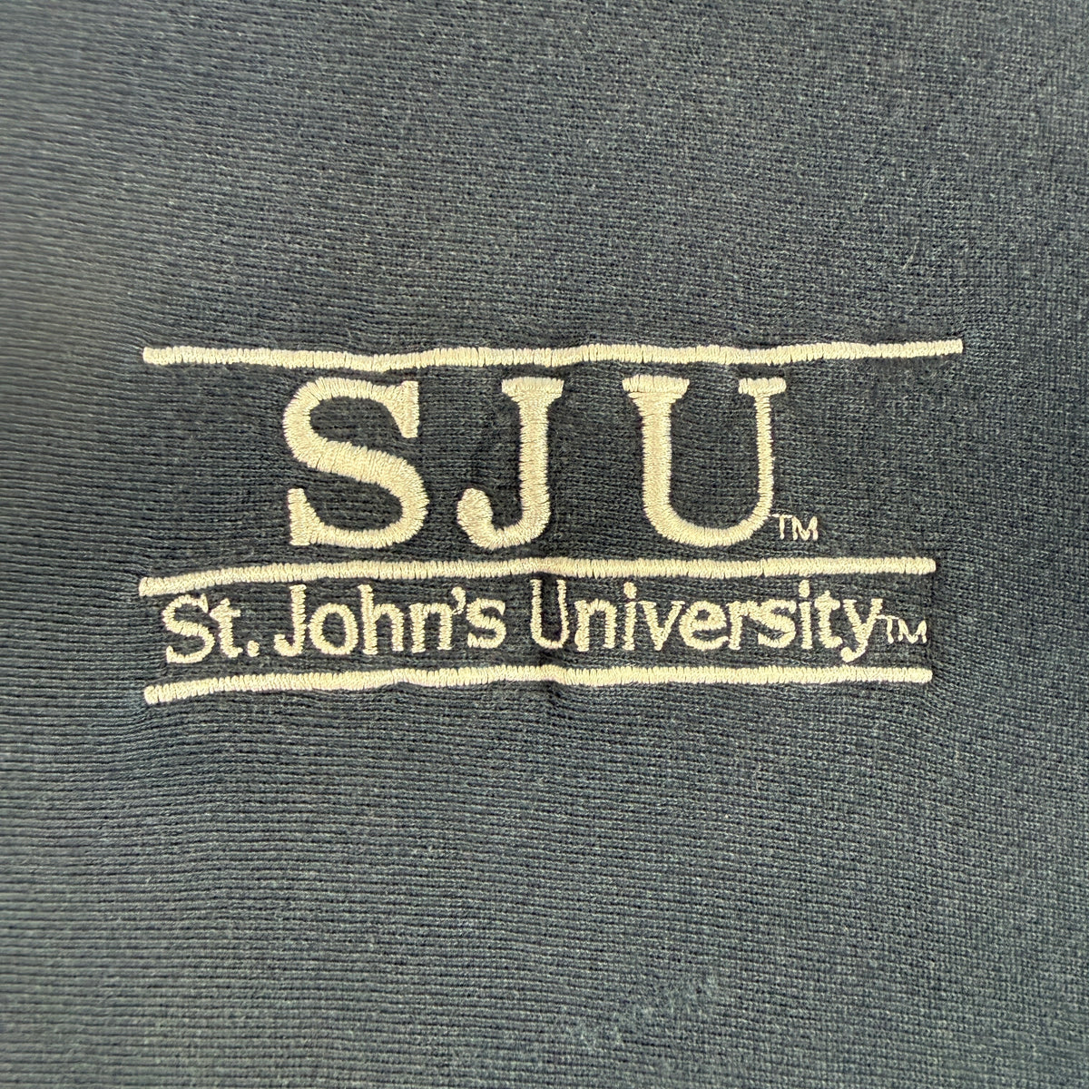 90's Champion リバースウィーブ SJU ネイビー スウェット XL 左胸 クリーム色の刺繍 超寄り